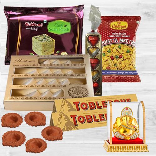 Joyful Diwali Hamper of Haldiram Sweets Snacks Diya n Lord Idol
