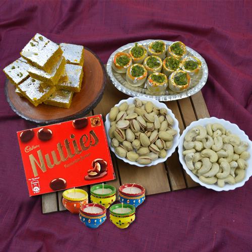 Alluring Gift of Haldiram Sweets Dry Fruits Chocolates n Wax Diya