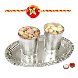 Special dry fruit hamper in Silver plated Glass and tray with 2 free Rakhi Roli tilak and Chawal