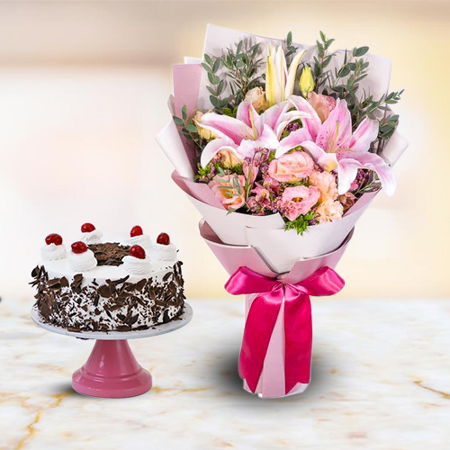 Seasonal Flowers gift pack with mouth watering Black Forest Cake