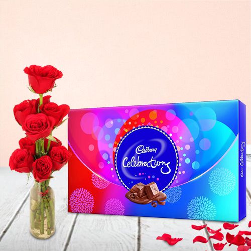 Impressive Gift of Red Roses in Vase with Cadbury Celebrations