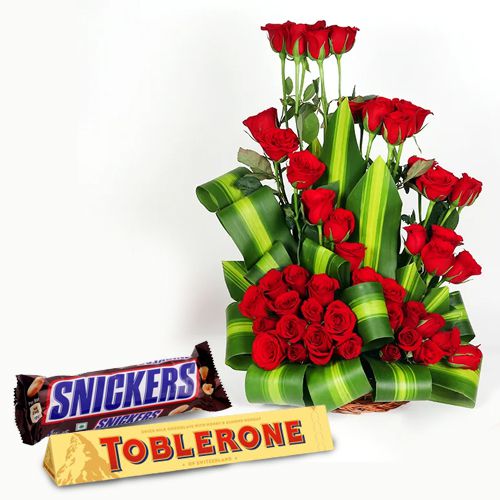 Alluring Red Roses Arrangement with Snickers n Toblerone
