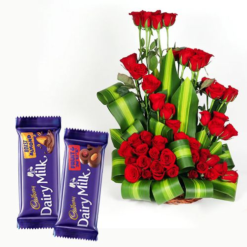 Alluring Gift of 50 Red Roses Basket with Cadbury Dairy Milk Silk