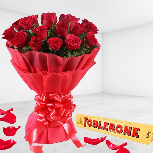 Breathtaking Red Roses Bouquet with Toblerone Exotic