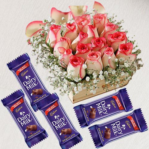 Impressive Dispaly of Pink Roses In Wooden Base with Cadbury Dairy Milk
