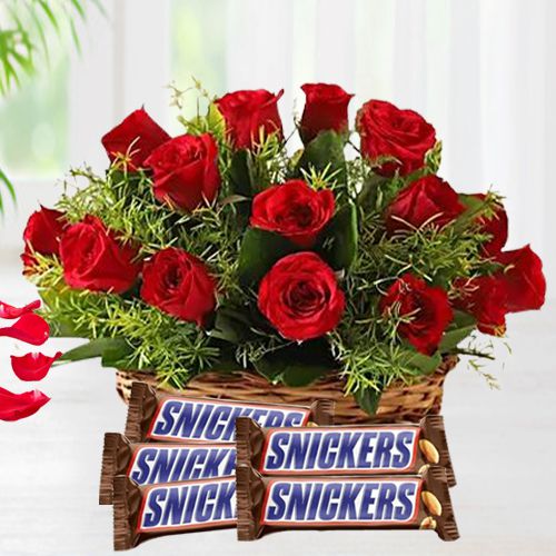 Gorgeous Red Roses Basket n Snickers Peanut Chocolate Bar Gift Combo