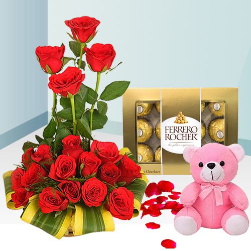 Attractive 18 Red Roses with Ferrero Rocher Chocolates and Teddy